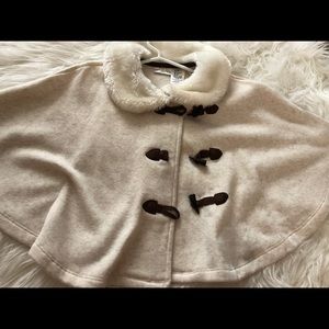 Cream cape with faux fur collar